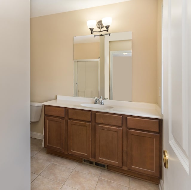 5640 Winnetka Ave N, New Hope, MN 55428 - full bath featuring a shower stall, tile patterned floors, vanity, and visible vents
