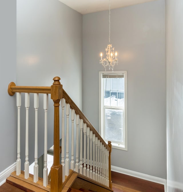 5640 Winnetka Ave N, New Hope, MN 55428 - staircase with baseboards, an inviting chandelier, and wood finished floors