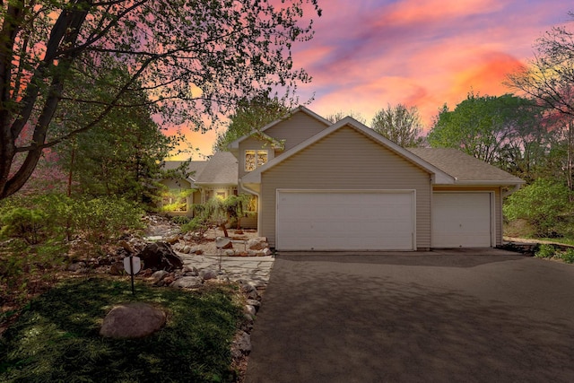 1950 Park Ridge Ct, Chaska, MN 55318 - view of front of home featuring asphalt driveway and an attached garage