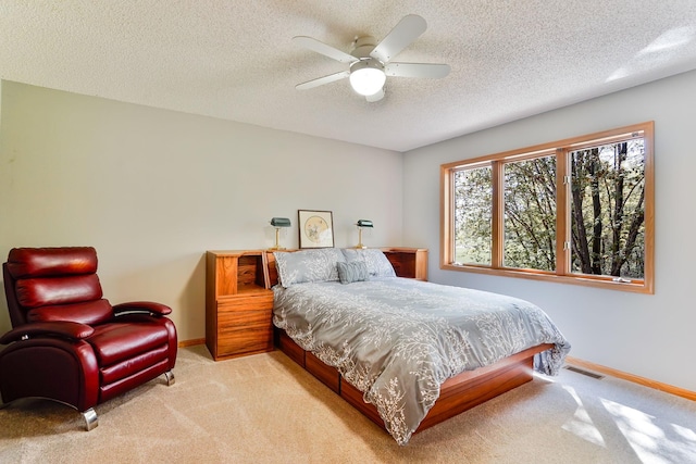 1950 Park Ridge Ct, Chaska, MN 55318 - bedroom with carpet floors, baseboards, a textured ceiling, and ceiling fan