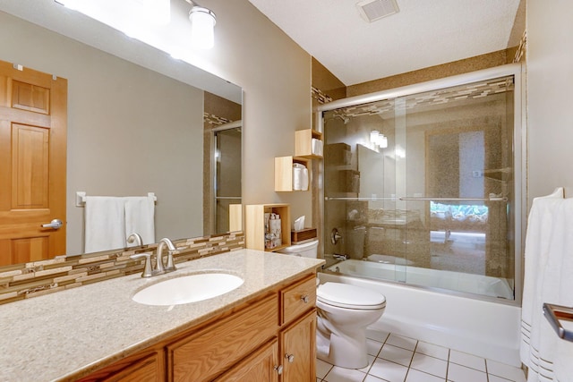 1950 Park Ridge Ct, Chaska, MN 55318 - bathroom with toilet, tile patterned floors, combined bath / shower with glass door, and vanity
