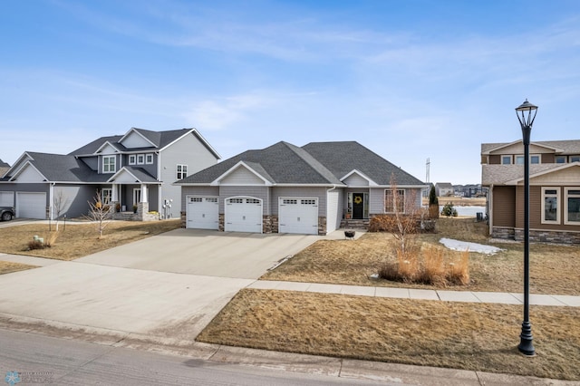 view of front of home featuring stone siding, concrete driveway, an attached garage, and a shingled roof