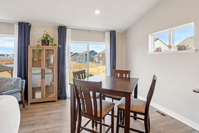 12273 71st Ct NE, Otsego, MN 55330 - dining area with plenty of natural light, light wood-type flooring, baseboards, and recessed lighting