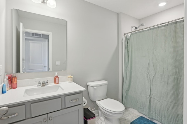 12273 71st Ct NE, Otsego, MN 55330 - full bathroom featuring toilet, vanity, and a shower with curtain