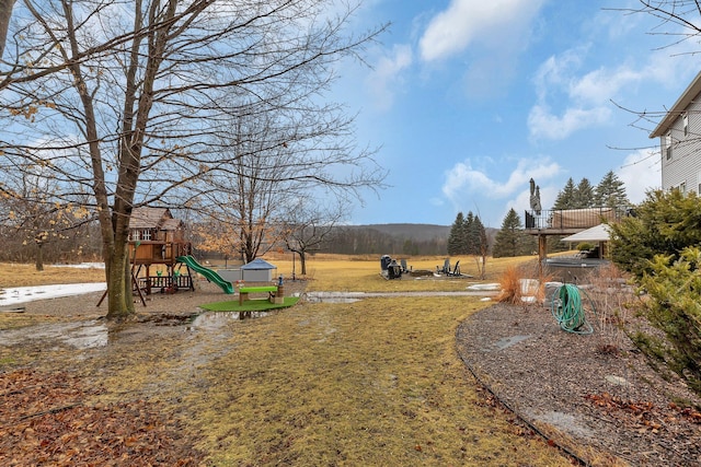 view of yard with a playground