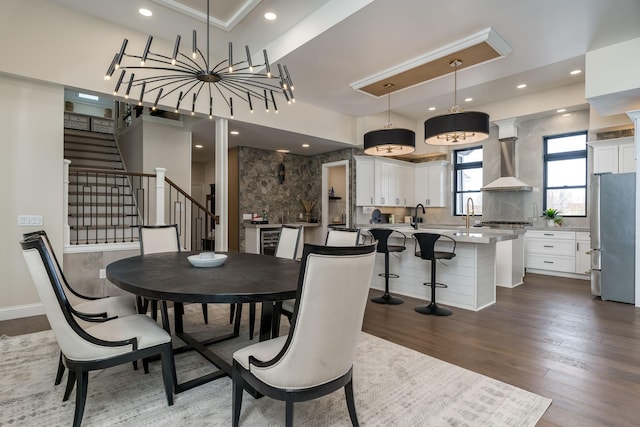 dining area featuring recessed lighting, stairway, and dark wood-type flooring