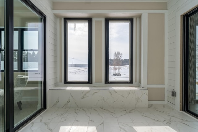 interior space with marble finish floor