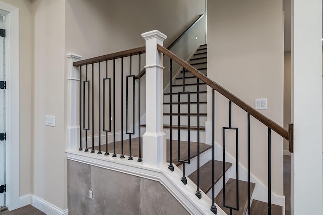 stairway with baseboards