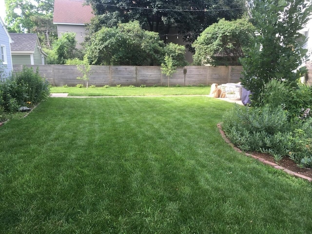 view of yard featuring fence