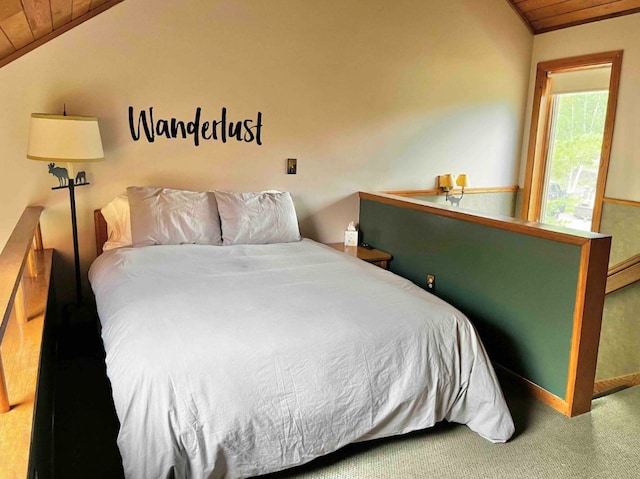 bedroom with carpet floors, lofted ceiling, wood ceiling, and a baseboard radiator