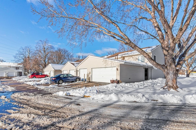 view of front of house featuring a garage and a residential view