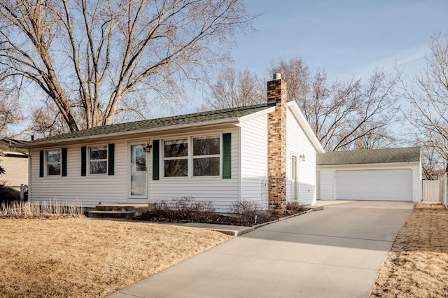 single story home with a garage and a chimney