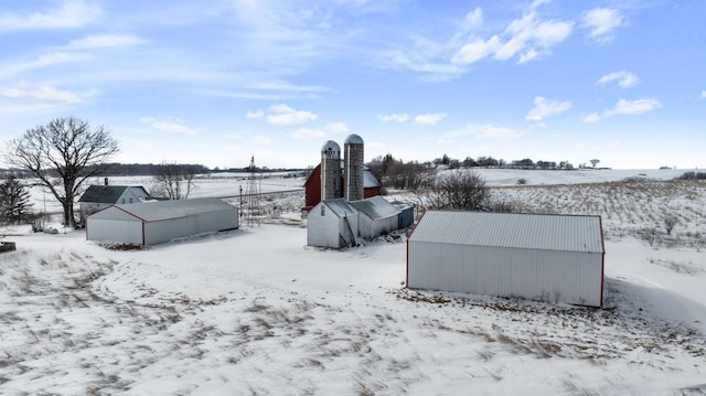 yard covered in snow with an outdoor structure