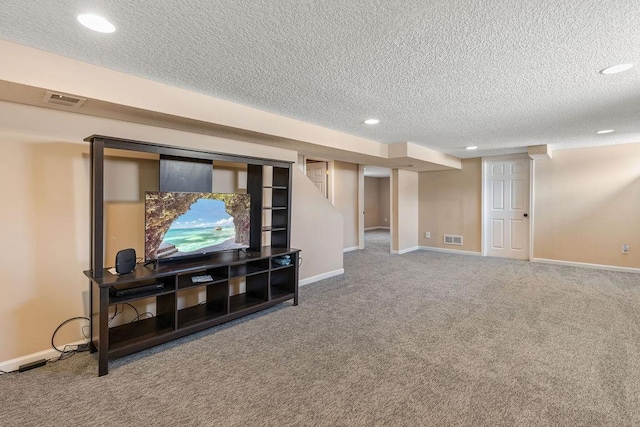 living room featuring a textured ceiling, carpet flooring, visible vents, and baseboards