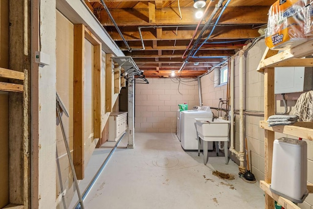 basement featuring washing machine and dryer