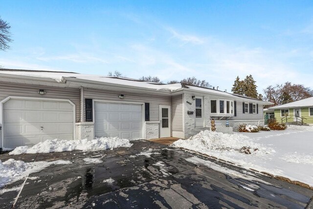 view of front of home featuring an attached garage