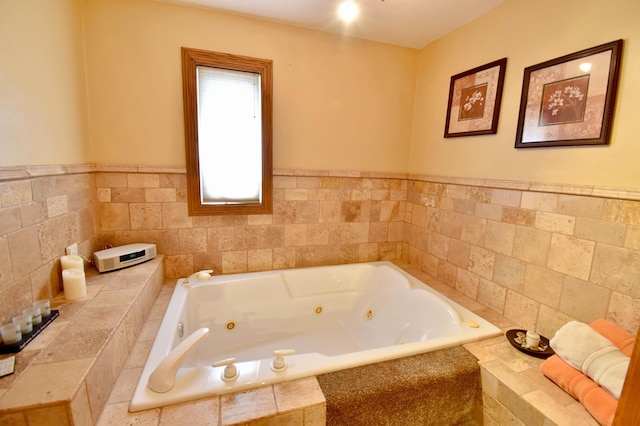 bathroom with a jetted tub