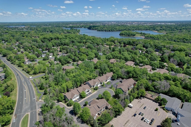 15436 70th Ave N, Maple Grove, MN 55311 - aerial perspective of suburban area featuring a large body of water and a heavily wooded area