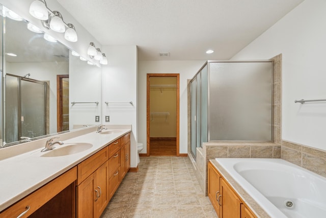 15436 70th Ave N, Maple Grove, MN 55311 - full bath featuring toilet, a shower stall, double vanity, a tub with jets, and a walk in closet