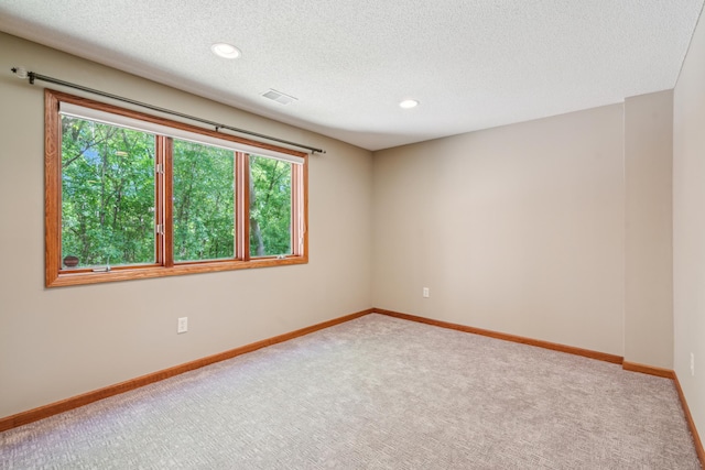 15436 70th Ave N, Maple Grove, MN 55311 - spare room with carpet floors, recessed lighting, baseboards, and a textured ceiling