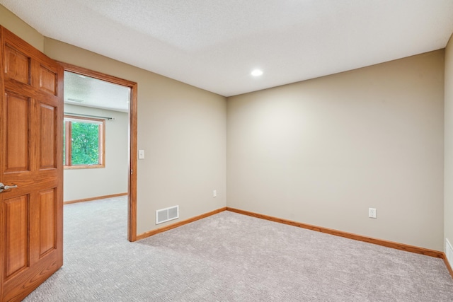 15436 70th Ave N, Maple Grove, MN 55311 - empty room featuring light colored carpet, baseboards, and recessed lighting