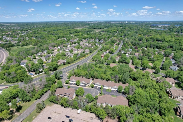 15436 70th Ave N, Maple Grove, MN 55311 - aerial overview of property's location with nearby suburban area and a heavily wooded area