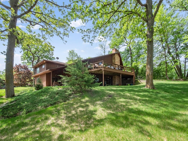 2904 Le Homme Dieu Vw NE, Alexandria, MN 56308 - rear view of property with a chimney, a deck, and a yard