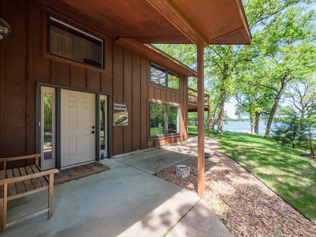 2904 Le Homme Dieu Vw NE, Alexandria, MN 56308 - property entrance with board and batten siding and a patio