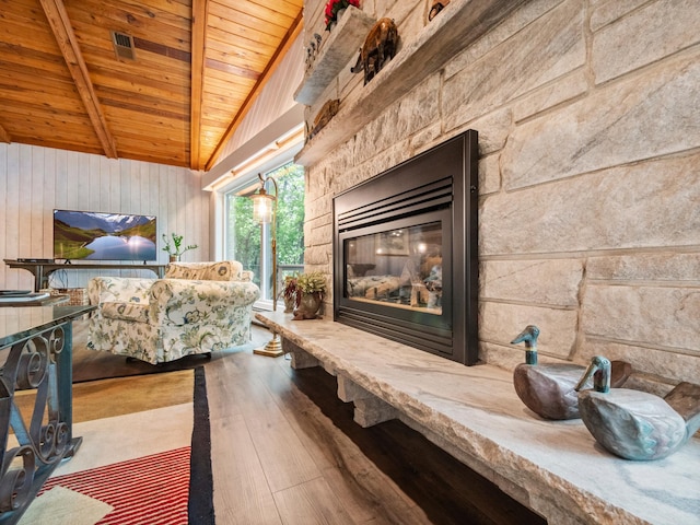 2904 Le Homme Dieu Vw NE, Alexandria, MN 56308 - living area with wooden ceiling, hardwood / wood-style flooring, a fireplace, and wooden walls