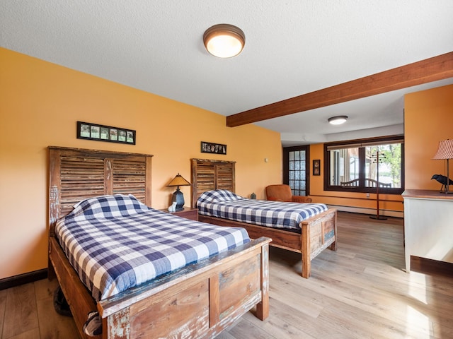 2904 Le Homme Dieu Vw NE, Alexandria, MN 56308 - bedroom with light wood-type flooring, beam ceiling, and baseboards