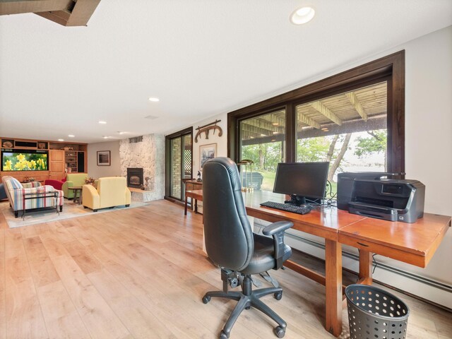 2904 Le Homme Dieu Vw NE, Alexandria, MN 56308 - office with wood finished floors, recessed lighting, and a fireplace