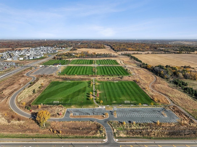 birds eye view of property featuring a rural view