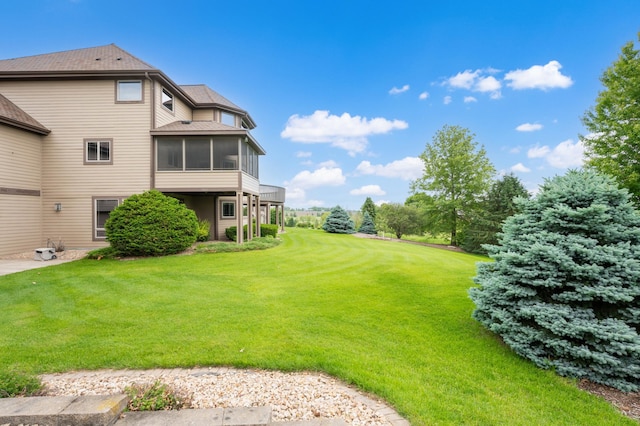 1502 Epperstone Enclave, Byron, MN 55920 - view of grassy yard with a sunroom