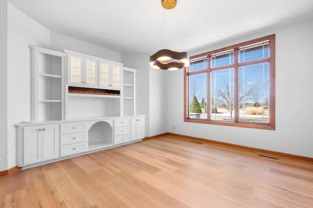 1502 Epperstone Enclave, Byron, MN 55920 - unfurnished office with baseboards and light wood finished floors