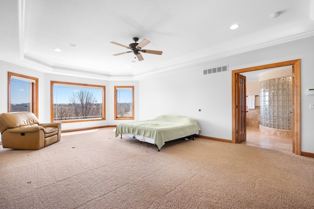 1502 Epperstone Enclave, Byron, MN 55920 - carpeted bedroom featuring a raised ceiling, crown molding, recessed lighting, ceiling fan, and connected bathroom