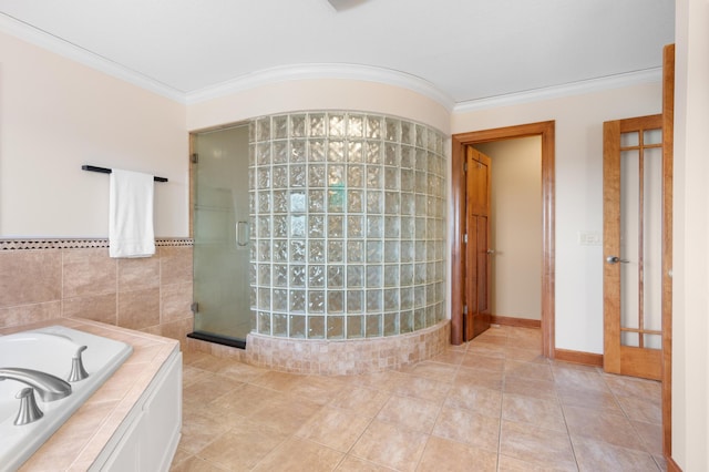 1502 Epperstone Enclave, Byron, MN 55920 - bathroom featuring a shower stall, ornamental molding, a garden tub, and tile patterned flooring