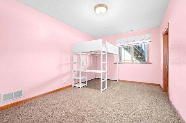1502 Epperstone Enclave, Byron, MN 55920 - unfurnished bedroom with carpet floors and baseboards