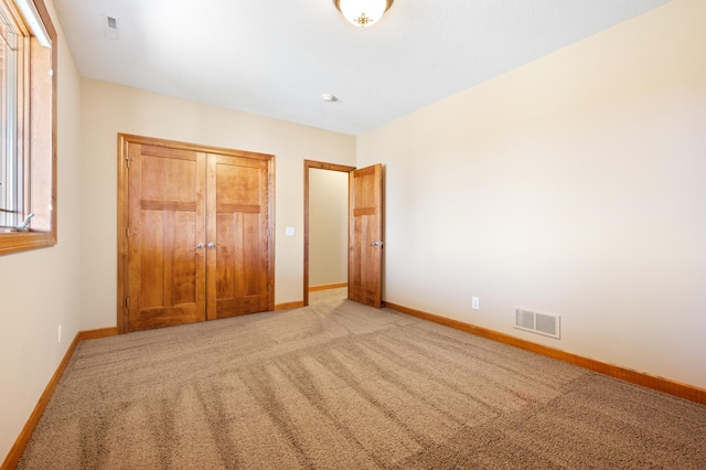 1502 Epperstone Enclave, Byron, MN 55920 - unfurnished bedroom with light colored carpet