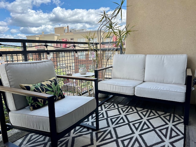 balcony with an outdoor hangout area