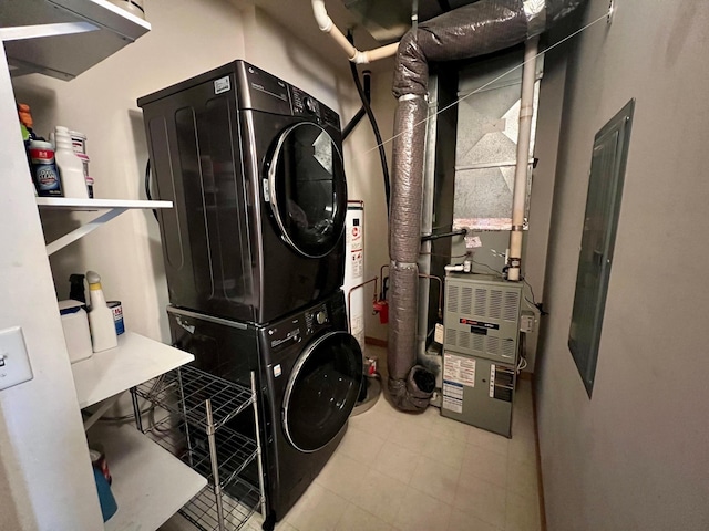 washroom with laundry area and stacked washing maching and dryer