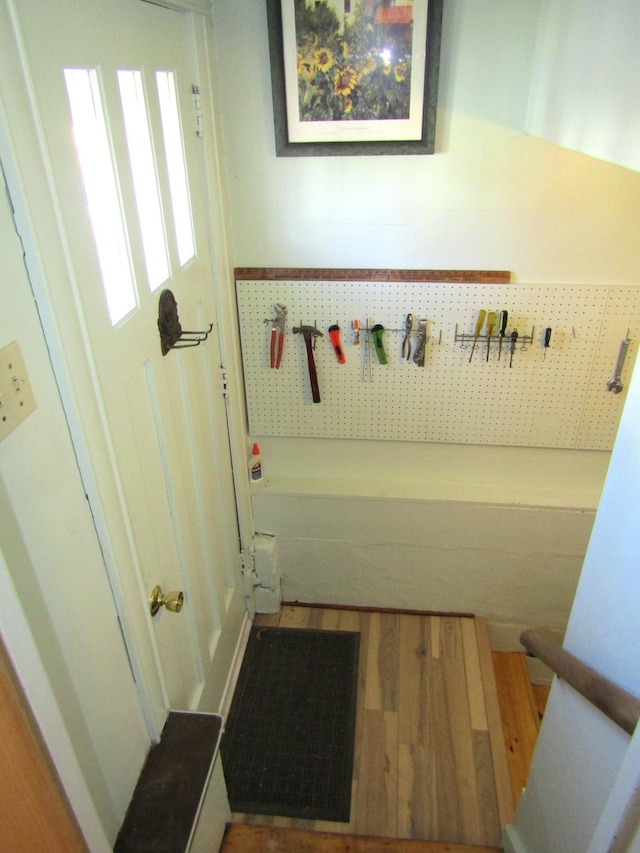 doorway to outside featuring wood finished floors