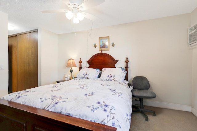 bedroom with a ceiling fan and baseboards