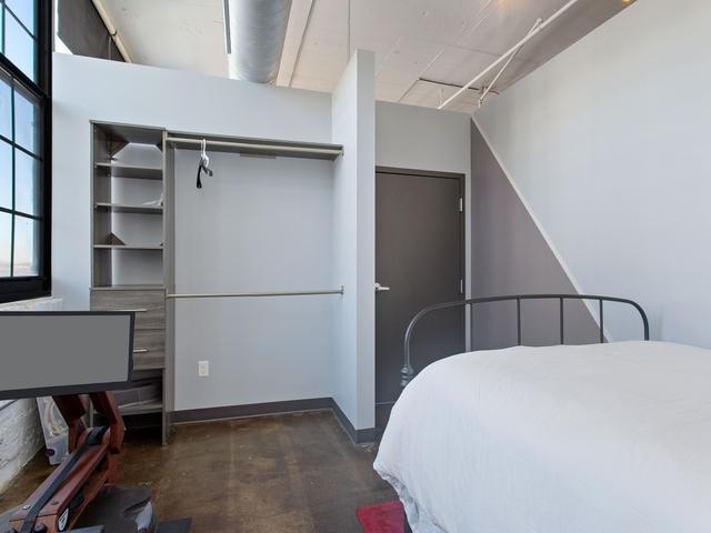 bedroom featuring baseboards