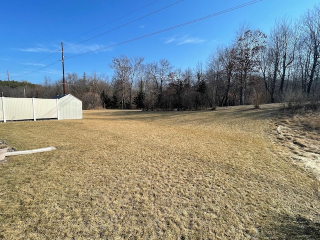 view of yard with fence