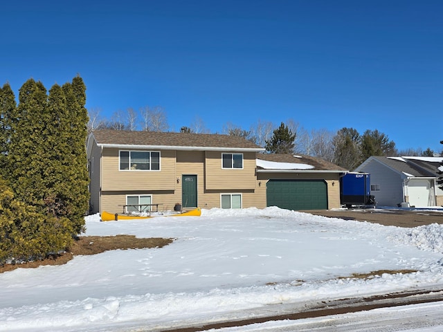 bi-level home with an attached garage