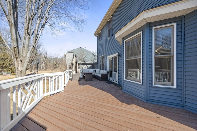 wooden deck featuring an outdoor hangout area