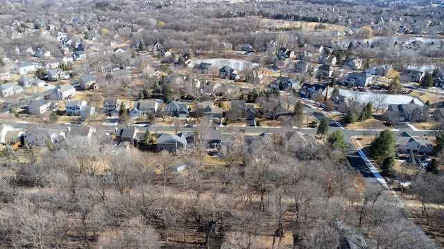 birds eye view of property with a residential view