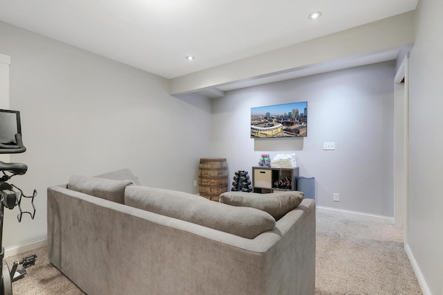 living area featuring recessed lighting, baseboards, and light carpet