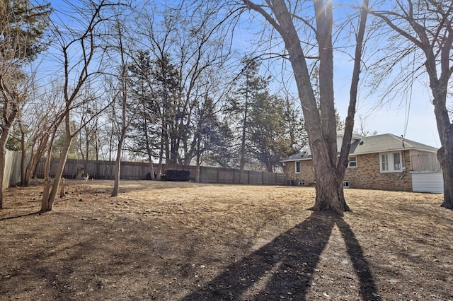 view of yard featuring a fenced backyard