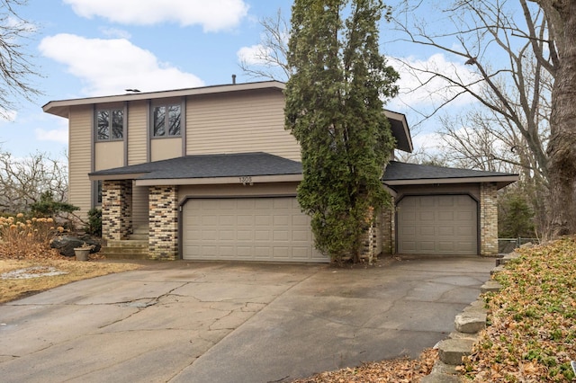 view of front of house with a garage and brick siding